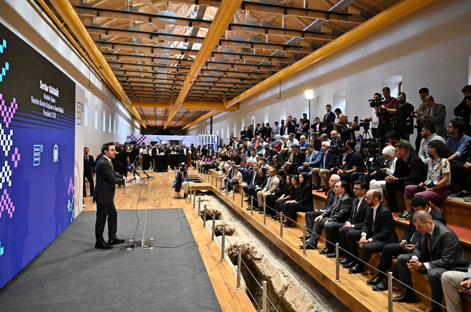 Anadolu Agency (AA) General Manager Serdar Karagöz delivers a speech at the first exhibition of the 10th year of the Istanbul Photo Awards, Istanbul, Türkiye, June 10, 2024. (AA Photo)