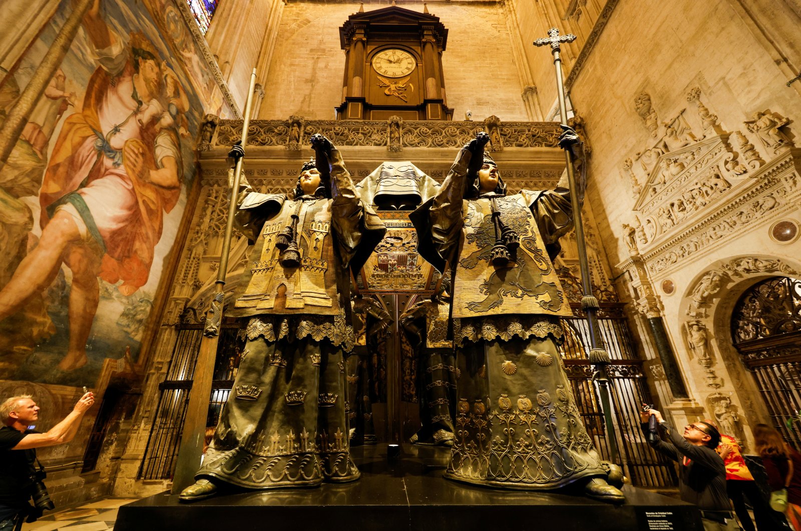 People visit the mausoleum of Christopher Columbus in the cathedral of Seville, Spain, Oct. 11, 2024. (Reuters Photo)