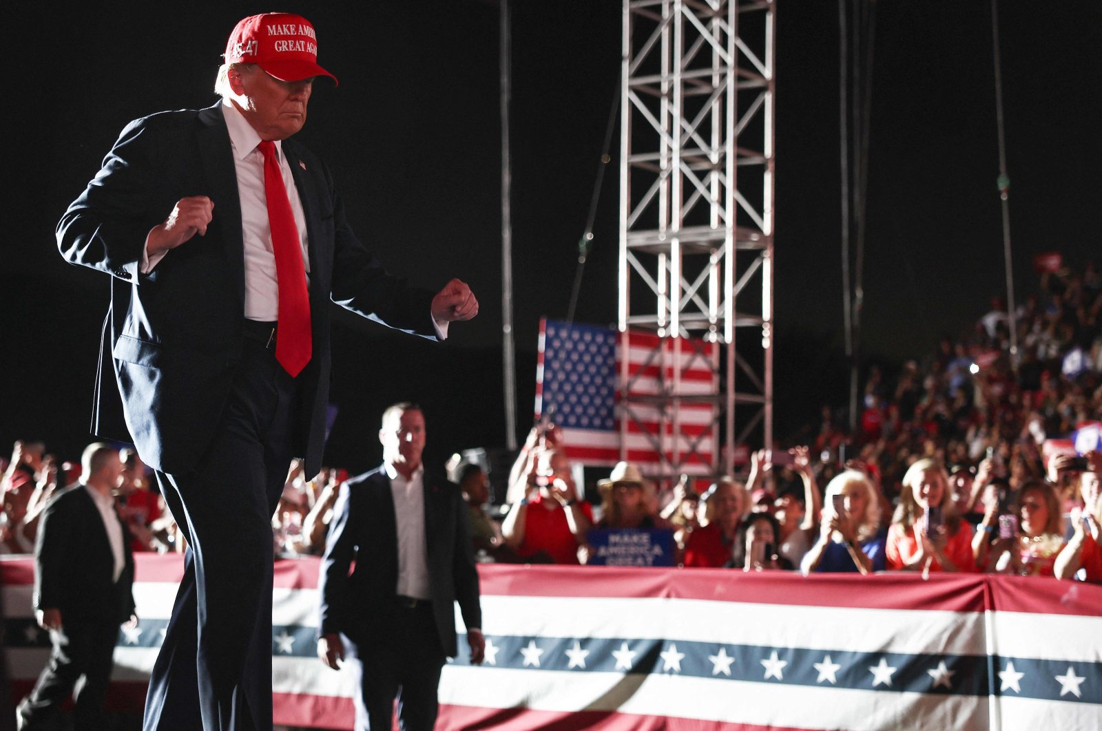 Republican presidential nominee, former U.S. President Donald Trump dances as he walks offstage after speaking at a campaign rally in Coachella, California, U.S., Oct. 12, 2024. (AFP Photo)