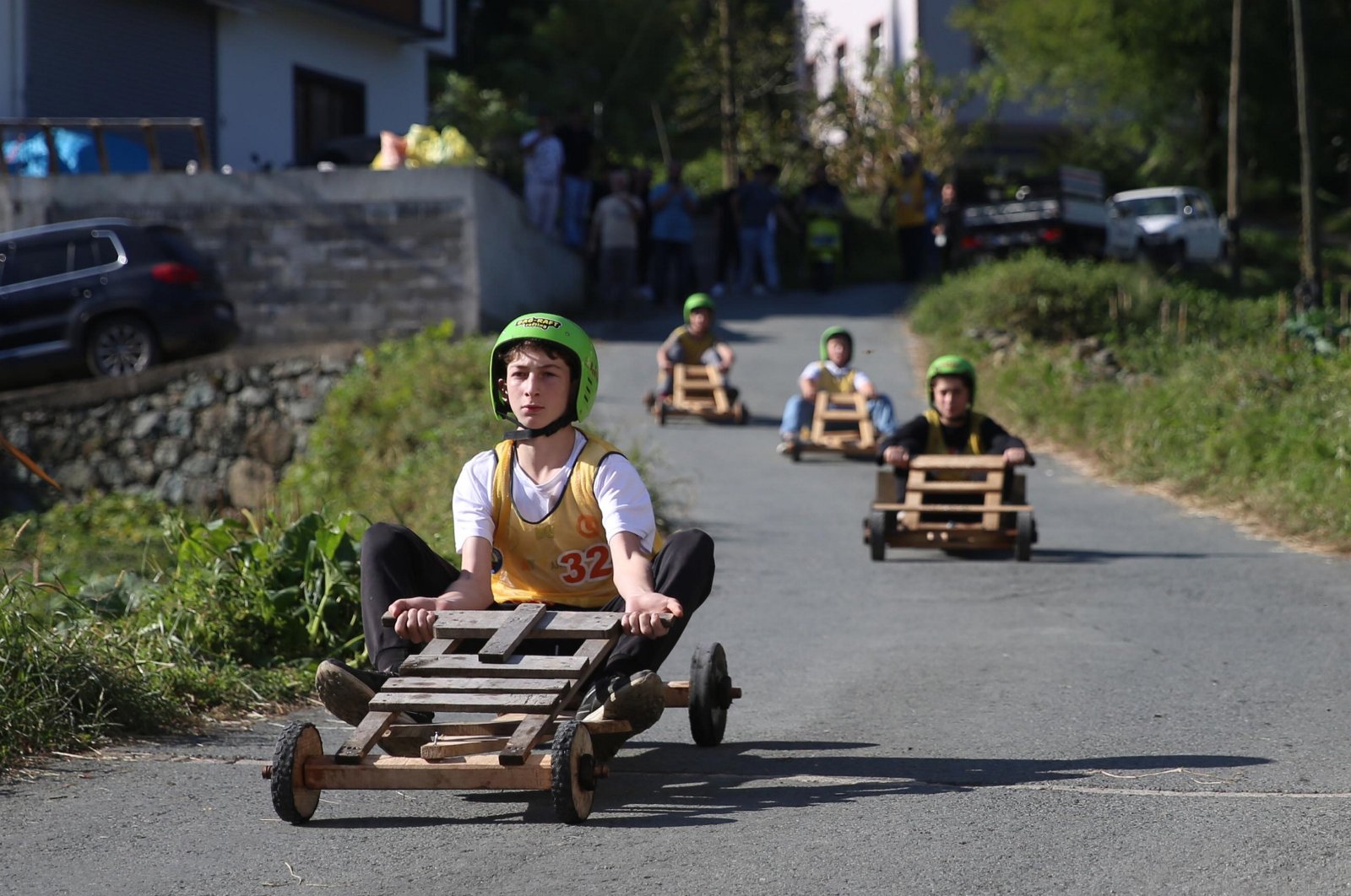 Racers compete during the annual wooden car racing festival, Çamlıhemşin, Rize, northern Türkiye, Oct. 12. (AA Photo)