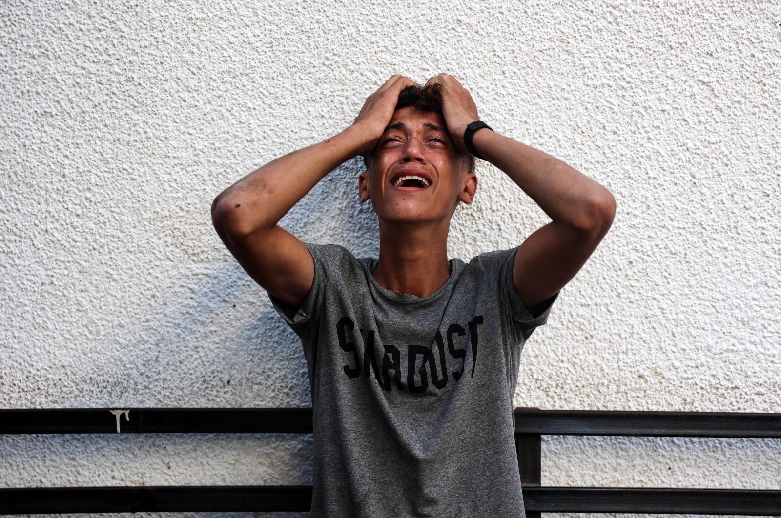 A Palestinian youth reacts upon seeing the bodies of relatives killed in an overnight Israeli airstrike, Jabalia, northern Gaza Strip, Palestine, Oct. 12, 2024. (AFP Photo)