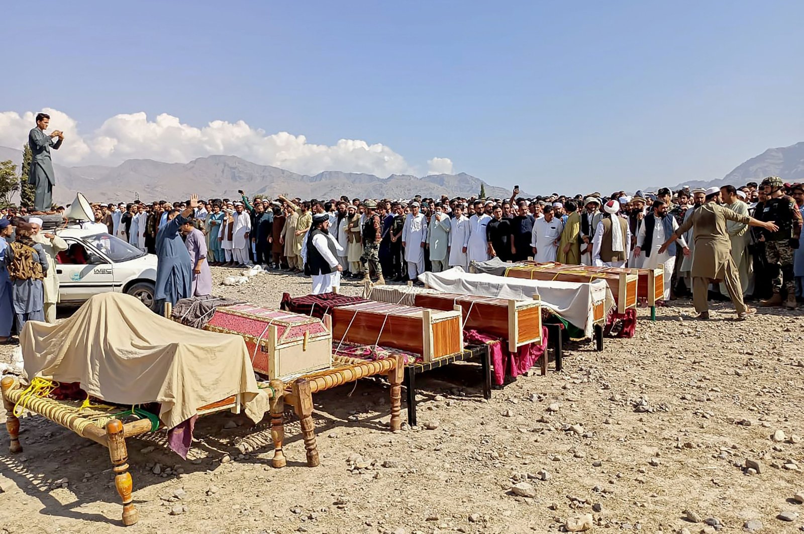 Sunni Muslim men gather at the funeral ceremony for victims killed in a tribal clash, at Kurram district in Khyber Pakhtunkhwa, Pakistan, Oct. 13, 2024. (AFP Photo)