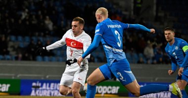 Türkiye&#039;s midfielder #07 Muhammed Kerem Aktürkoğlu (L) and Iceland&#039;s defender #03 Valgeir Fridriksson vie for the ball during the UEFA Nations League, League B Group B4 football match at the Laugardsvollur stadium, Reykjavik, Oct. 14, 2024. (AFP Photo)