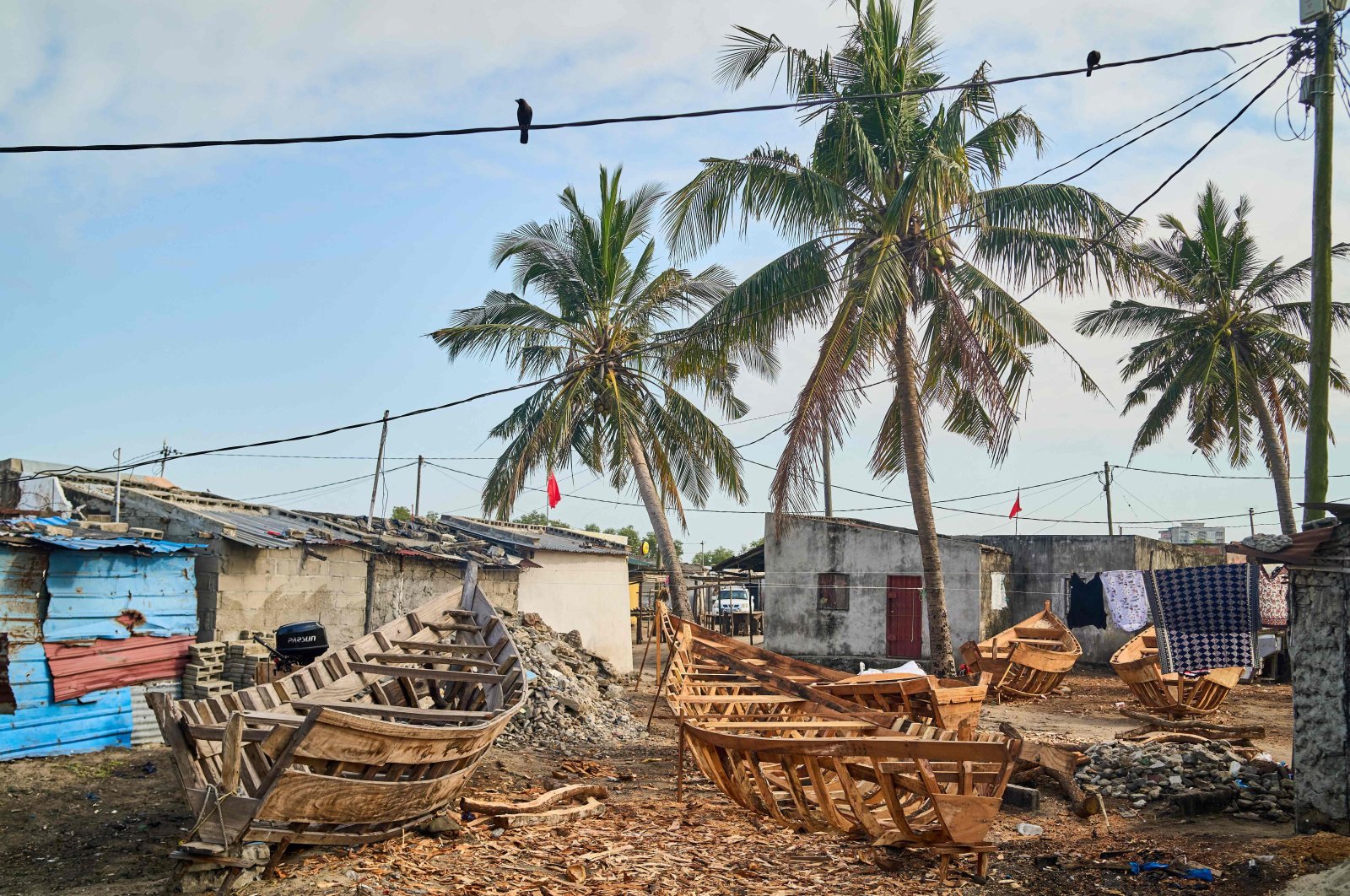 A general view of boats under construction at a house in the fishing community at Praia Novo in Beira, Mozambique, Oct. 8, 2024. (AFP Photo)