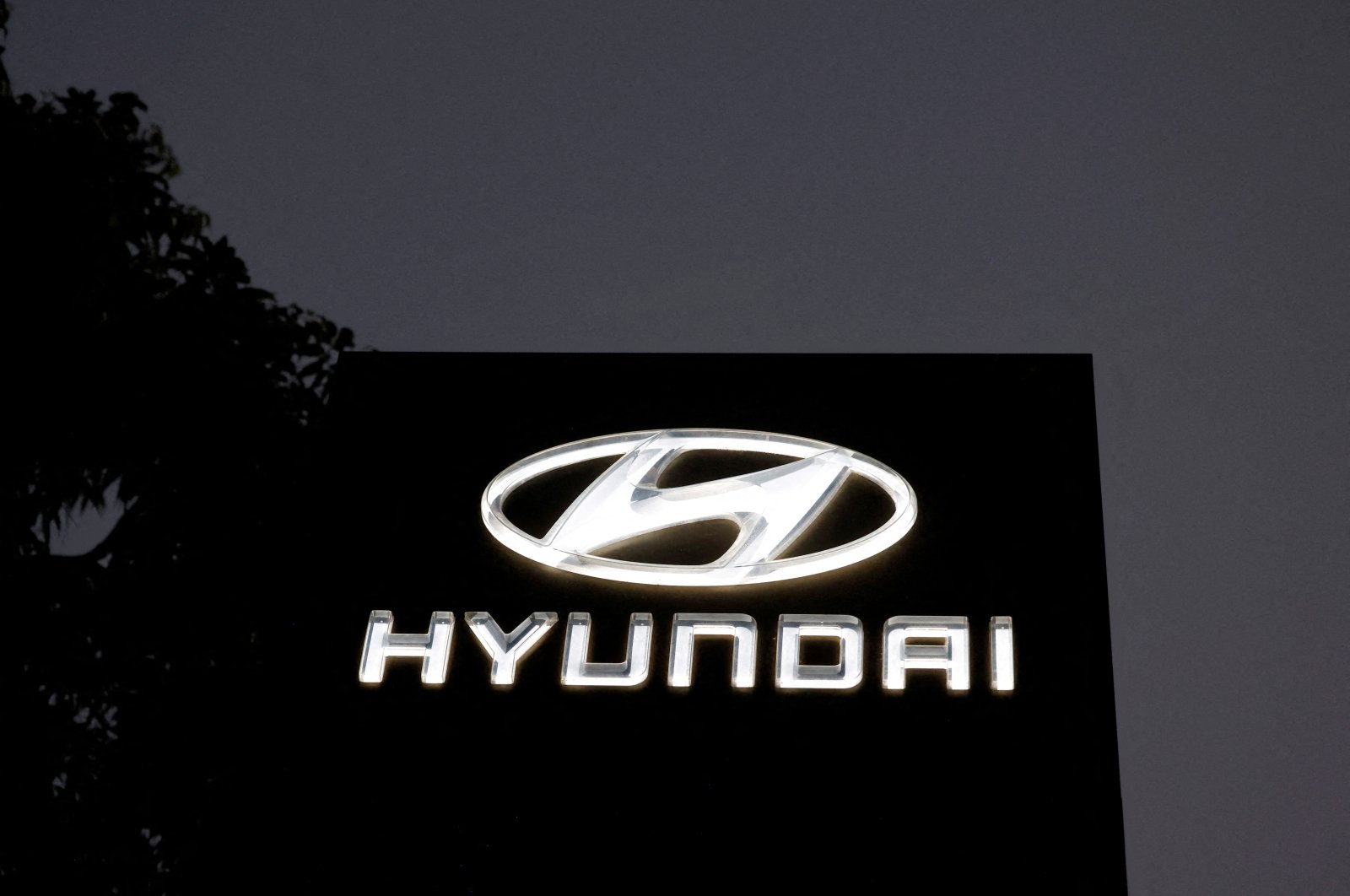 The Logo of Hyundai Motor India Limited is seen outside a car showroom in Ahmedabad, India, Oct. 7, 2024. (Reuters Photo)