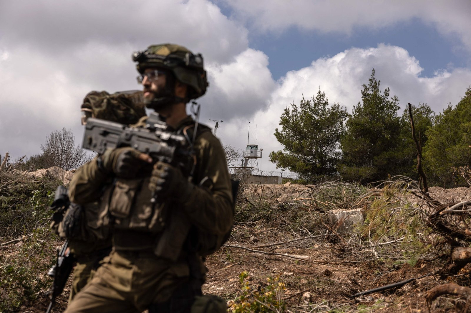 An Israeli soldier operates near a United Nations Interim Force In Lebanon (UNIFIL) base in Naqoura, southern Lebanon, Oct. 13, 2024. (AFP Photo)