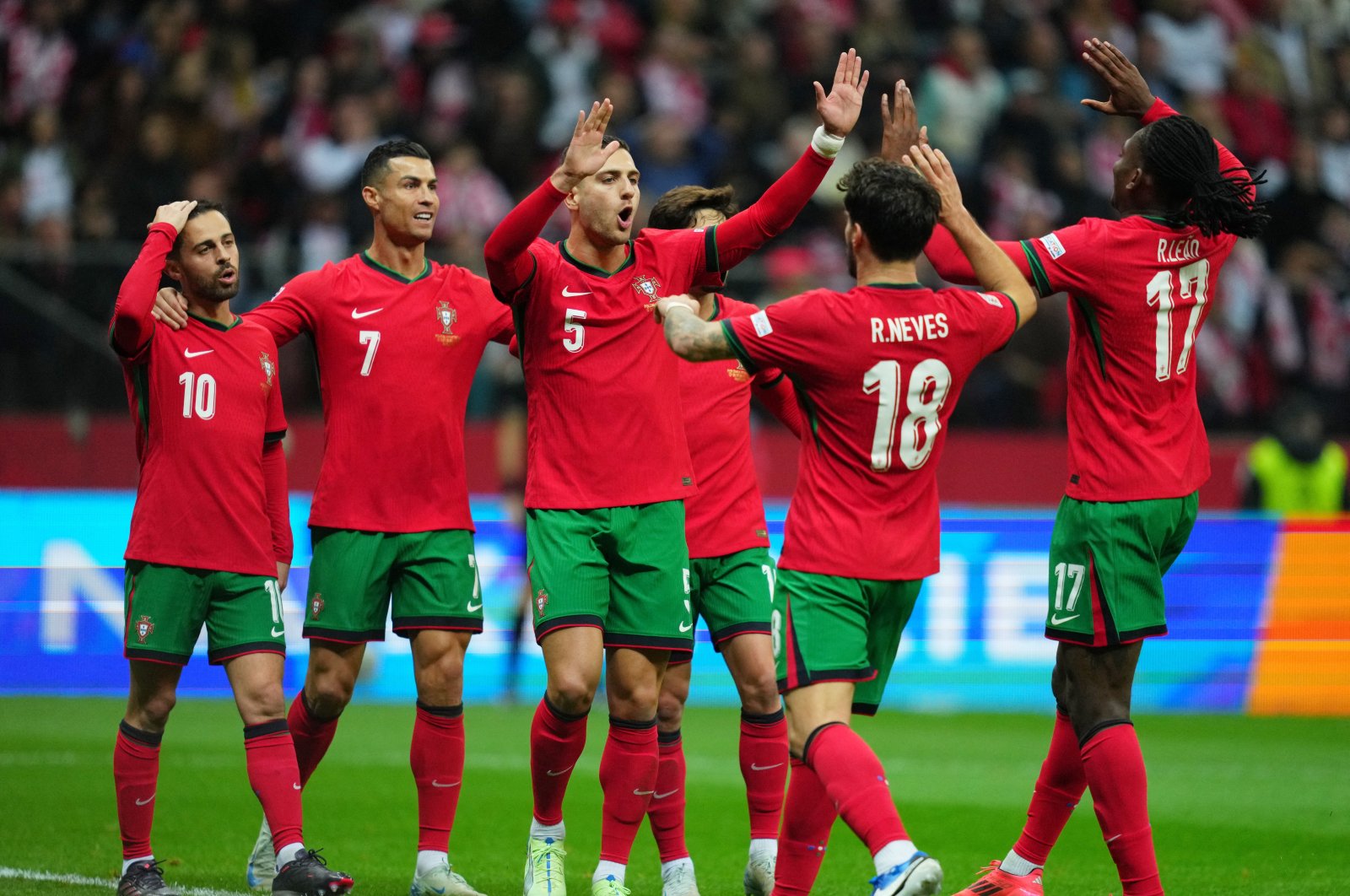 Portugal players celebrate after Bernardo Silva&#039;s goal against Poland during the UEFA Nations League Group A1 match, PGE Narodowy, Warsaw, Poland, Oct. 12, 2024. (Reuters Photo)