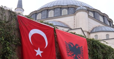 The flags of Türkiye and Albania hang on the wall of the Namazgah Mosque in Albania, built in 2015 with the support of Türkiye as the largest mosque in the Balkans, Tirana, Albania, Oct. 10, 2024. (AA Photo)