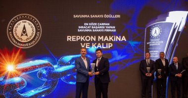 Presidency of Defense Industries (SSB) head Haluk Görgün presents Repkon an award for the institution's international success, Bursa, northwestern Türkiye, Oct. 14, 2024. (AA Photo)