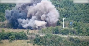 Smoke rises after North Korea blew up sections of inter-Korean roads on its side of the border, Oct. 15, 2024. (Reuters Photo)
