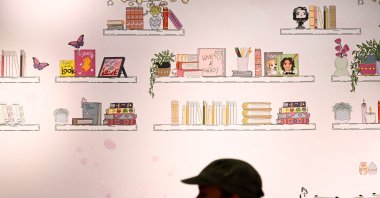 An employee prepares a stand on a pavilion of the Frankfurt Book Fair, Germany, Oct. 14, 2024. (AFP Photo)