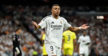 Real Madrid's Kylian Mbappe reacts during the La Liga football match against Villarreal at the Santiago Bernabeu stadium, Madrid, Spain, Oct. 5, 2024. (AFP Photo)