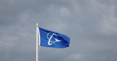 The Boeing logo is pictured on a flag at the 54th International Paris Air Show at Le Bourget Airport near Paris, France, June 20, 2023. (Reuters Photo)