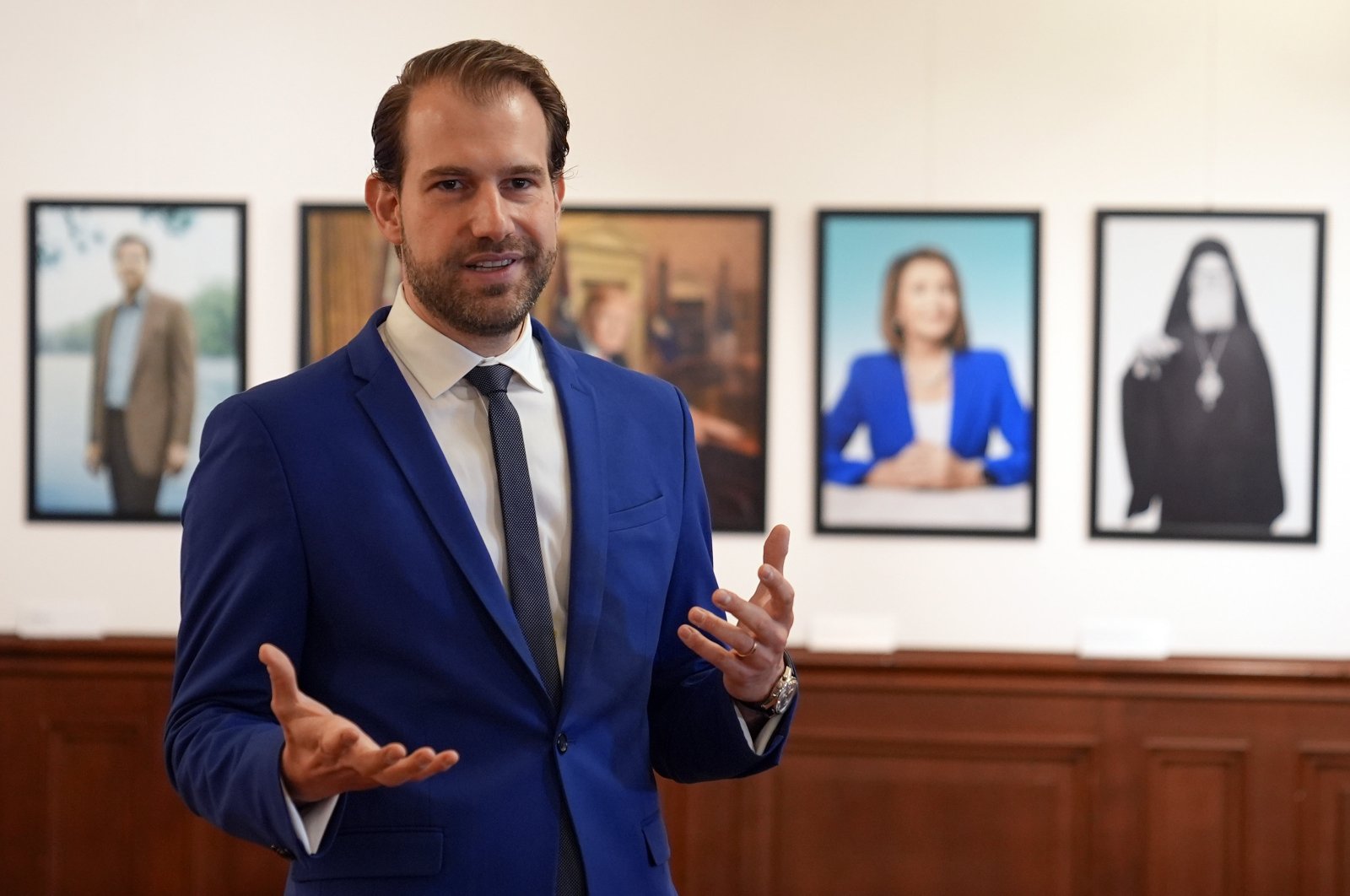 Photographer Pari Dukovic addresses journalists during the opening of his first solo exhibition in Türkiye, titled &quot;From Istanbul to New York: A Photographer&#039;s Journey,&quot; Istanbul, Türkiye, Sept. 25, 2024. (AA Photo)