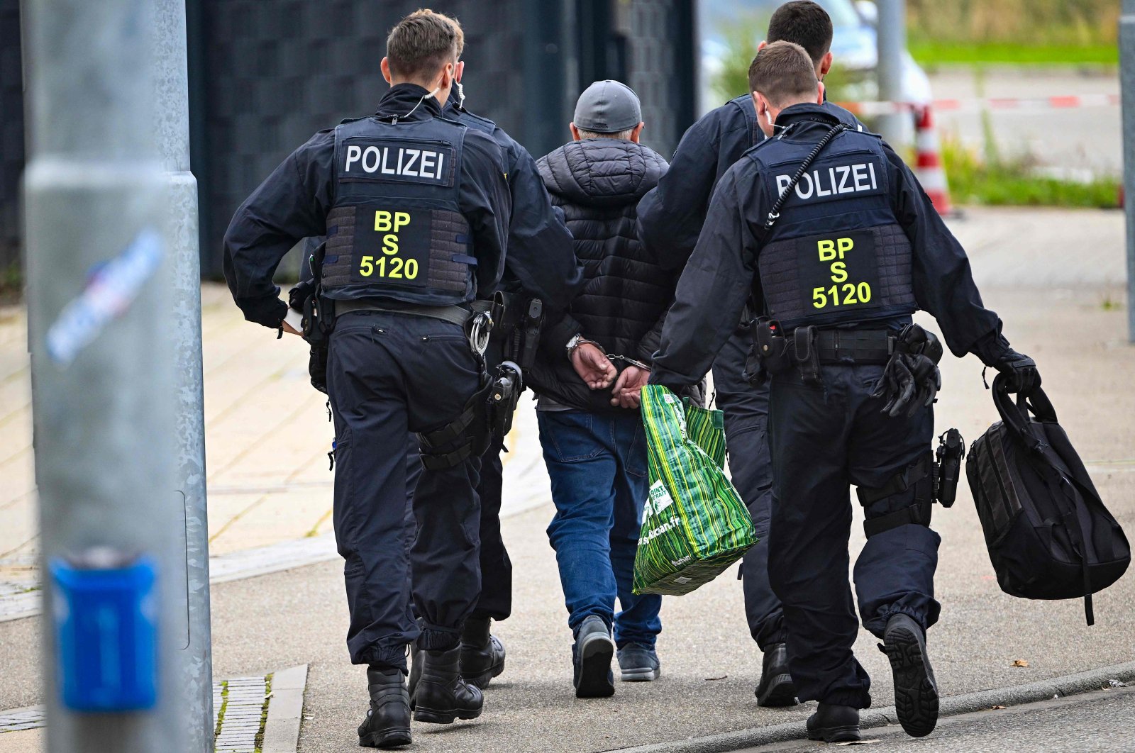 German police officers detain a man on the German/French border in Kehl, western Germany, Sept. 16, 2024. (AFP Photo)