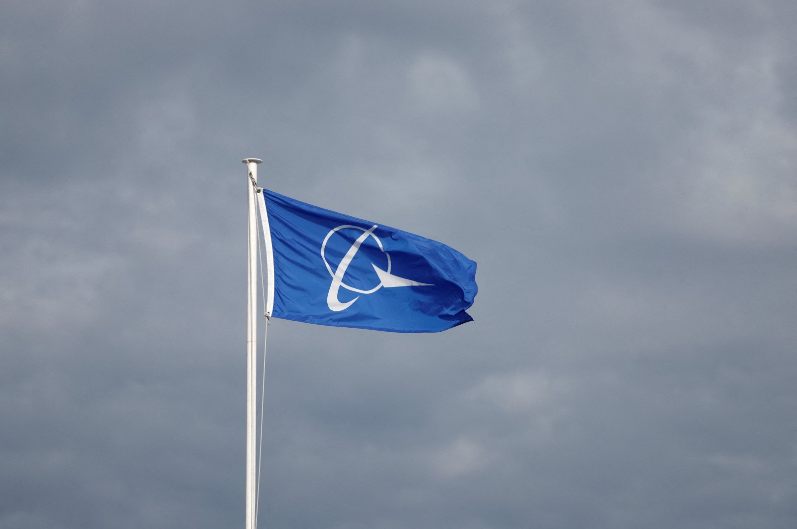 The Boeing logo is pictured on a flag at the 54th International Paris Air Show at Le Bourget Airport near Paris, France, June 20, 2023. (Reuters Photo)