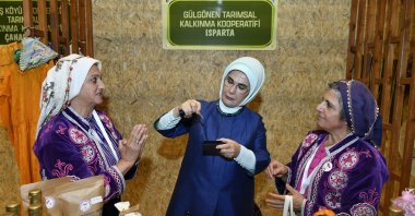 First lady Emine Erdoğan tour the displays of handmade crafts and food products from 18 women’s cooperatives, Ankara, Türkiye, Oct. 15, 2024. (AA Photo)