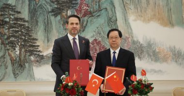 Treasury and Finance Minister Alparslan Bayraktar and his Chinese counterpart Wang Guanghua (R) during a ceremony to sign a memorandum of understanding on cooperation in the field of rare earth elements and mining, Tianjin, China, Oct. 16, 2024. (AA Photo)