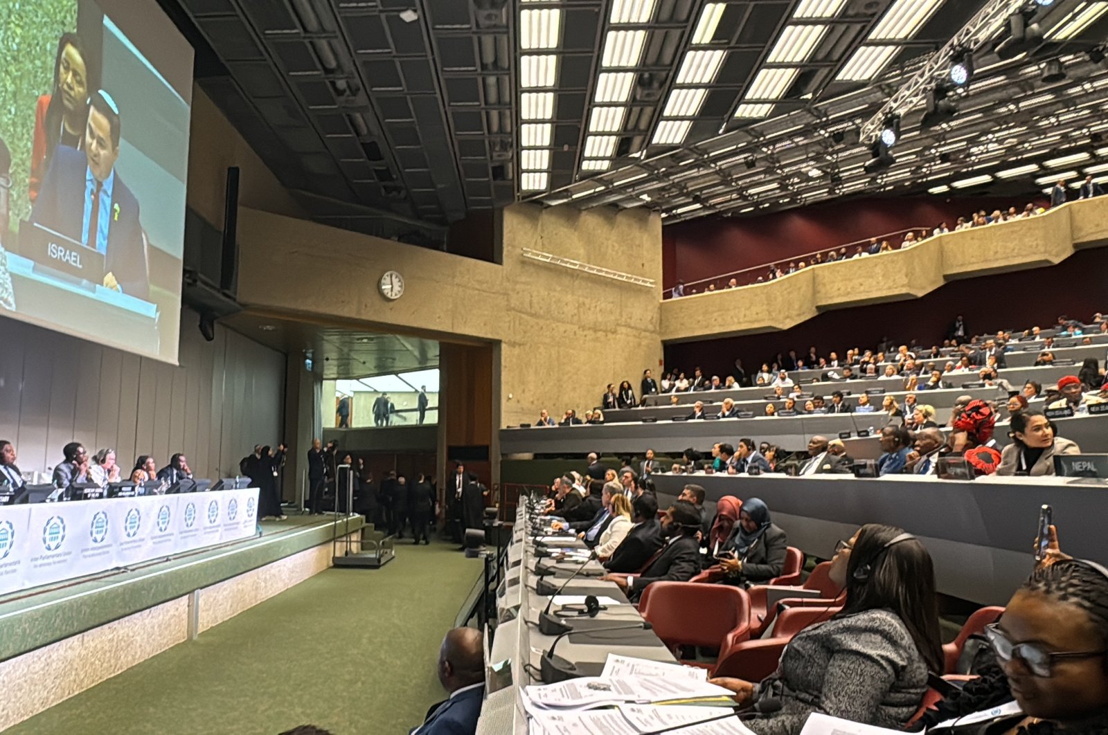 Lawmakers walk out in protest as the Israeli delegation speaks at the 149th General Assembly of the Inter-Parliamentary Union (IPU) in Geneva, Switzerland, Oct. 15, 2024. (AA Photo)