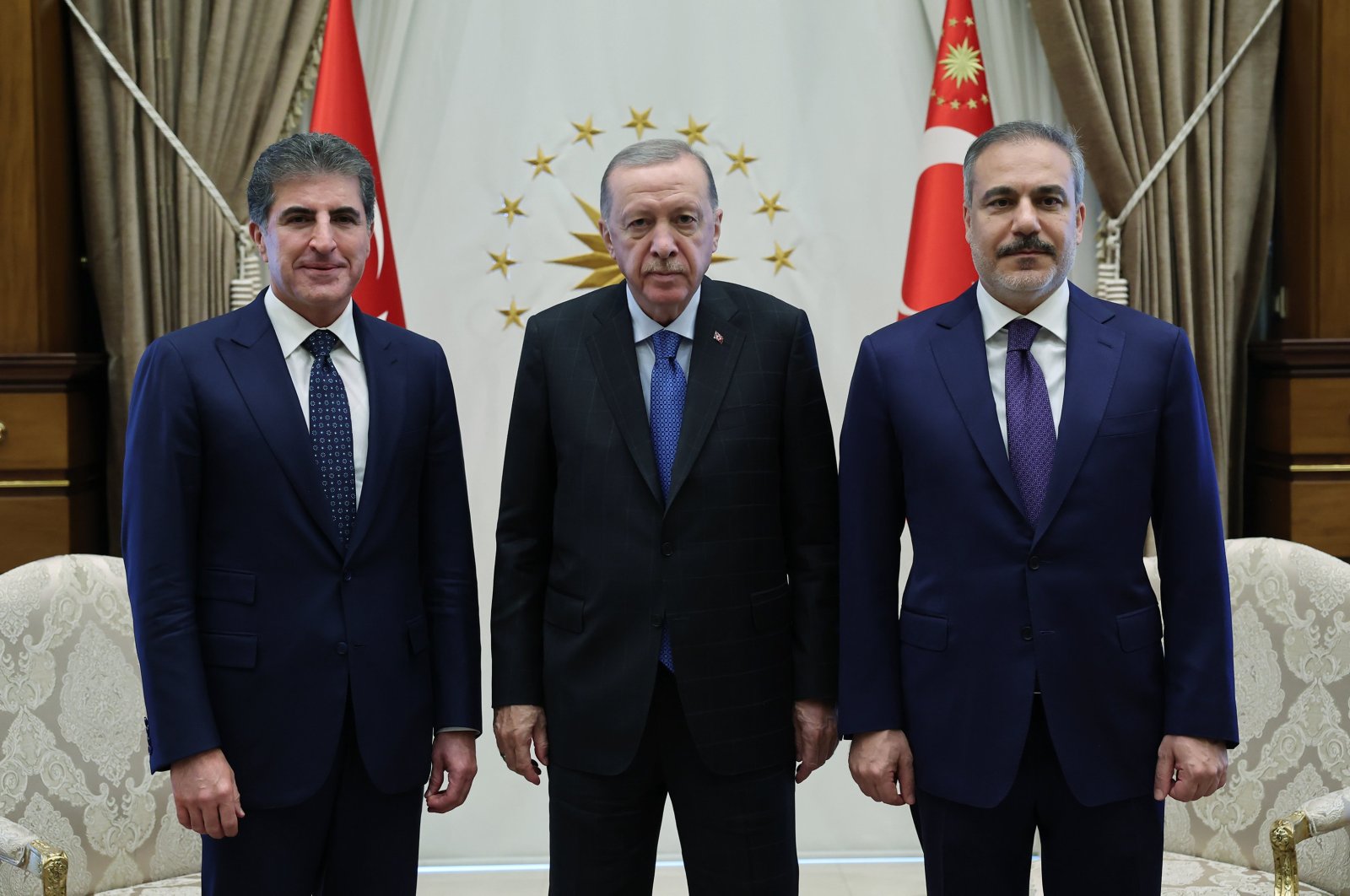 President Recep Tayyip Erdoğan (C), Kurdish Regional Government (KRG) President Nechirvan Barzani (L) and Foreign Minister Hakan Fidan (R) pose ahead of a meeting in the capital Ankara, Türkiye, Oct. 16, 2024. (AA Photo)