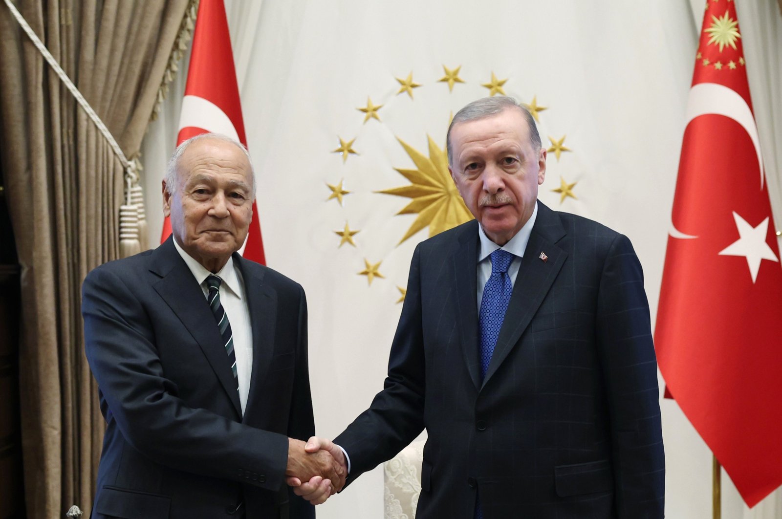 President Recep Tayyip Erdoğan and the Secretary-General of the Arab League Ahmed Aboul Gheit shake hands at the Presidential Complex in Ankara, Oct. 16, 2024. (DHA Photo)