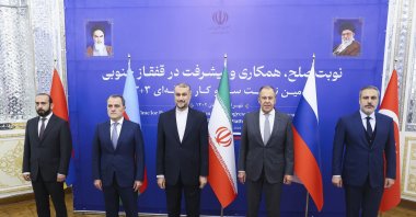 From left to the right, Armenian Foreign Minister Ararat Mirzoyan, Azerbaijani Foreign Minister Jeyhun Aziz, the late Iranian Foreign Minister Hossein Amirabdollahian, Russian Foreign Minister Sergey Lavrov and Foreign Minister Hakan Fidan pose for a photo during their meeting in Tehran, Iran, Oct. 23, 2023. (AP Photo)