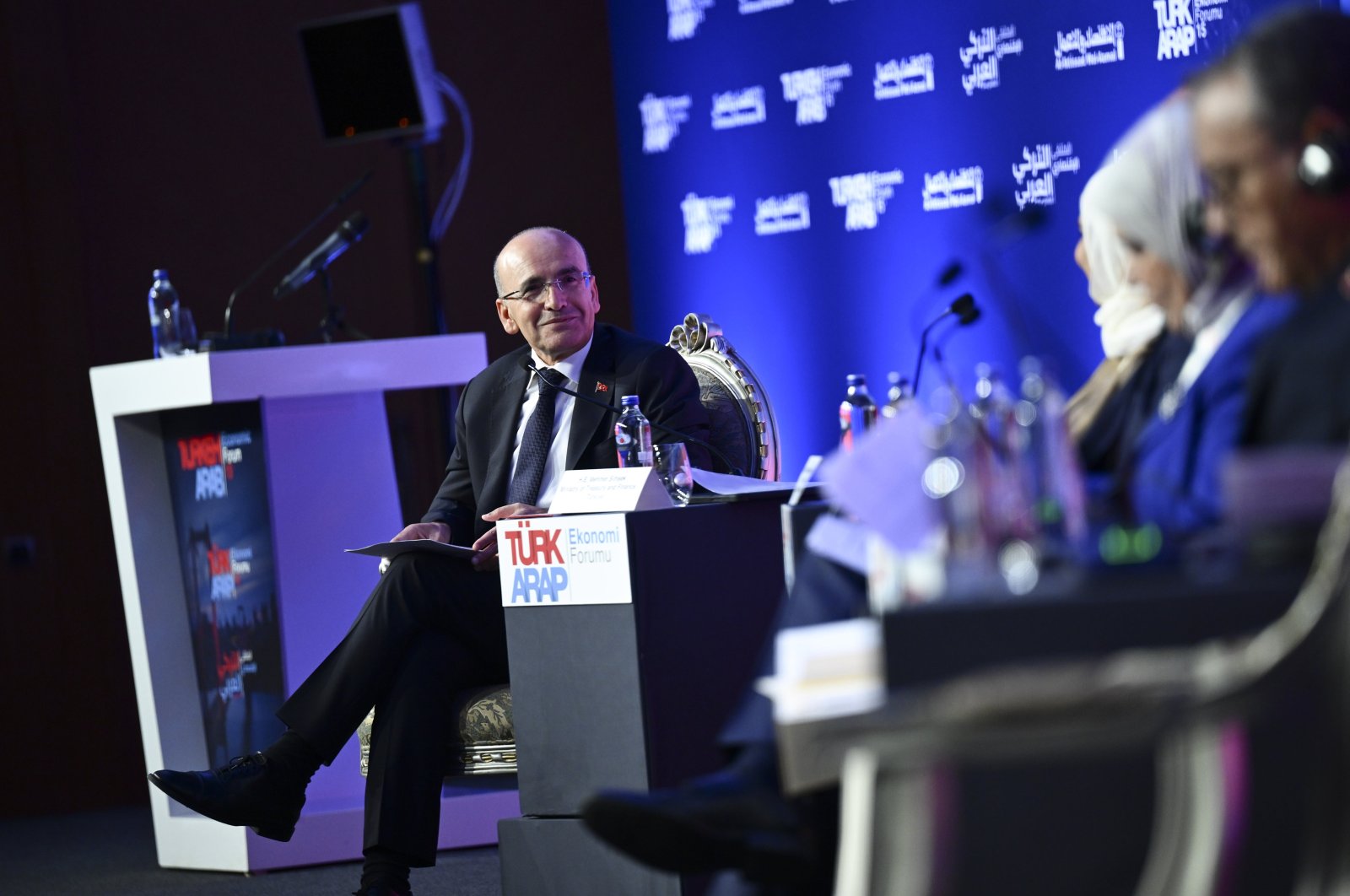 Treasury and Finance Minister Mehmet Şimşek delivers a speech at the 15th Turkish-Arab Economic Forum (TAF 2024), Istanbul, Türkiye, Oct. 17, 2024. (AA Photo)