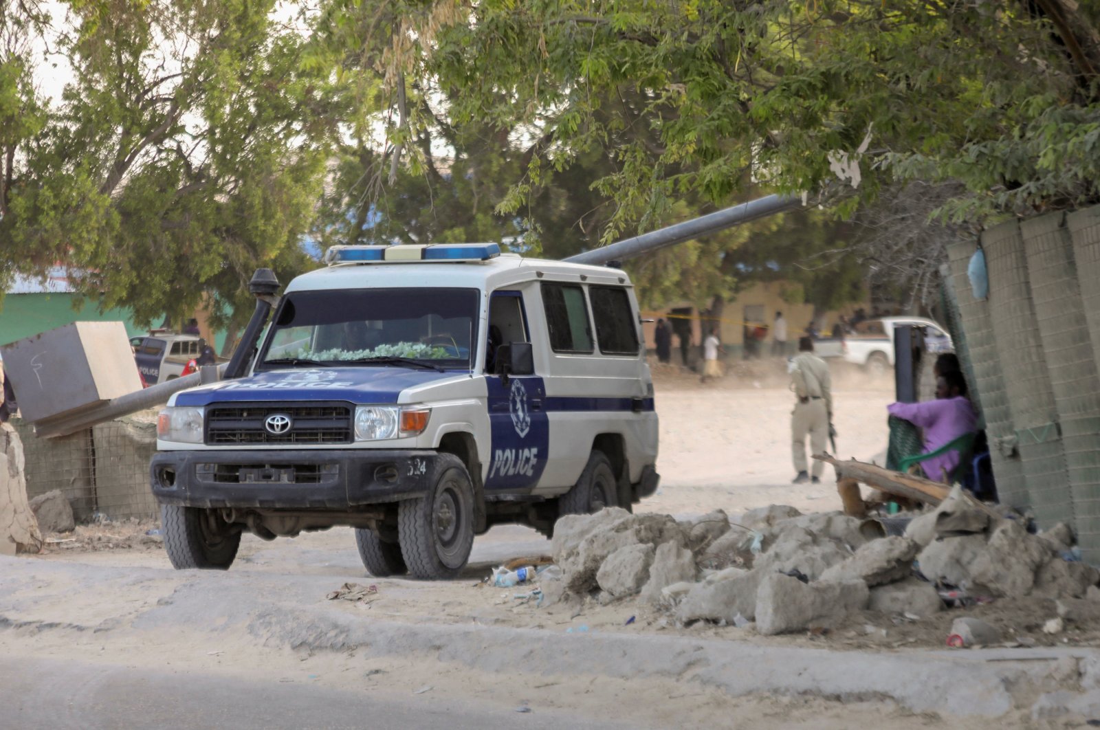 A Somali police ambulance leaves from the scene of an explosion in a restaurant often patronized by police officers, near a police training camp in Mogadishu, Somalia Oct. 17, 2024. (Reuters Photo)