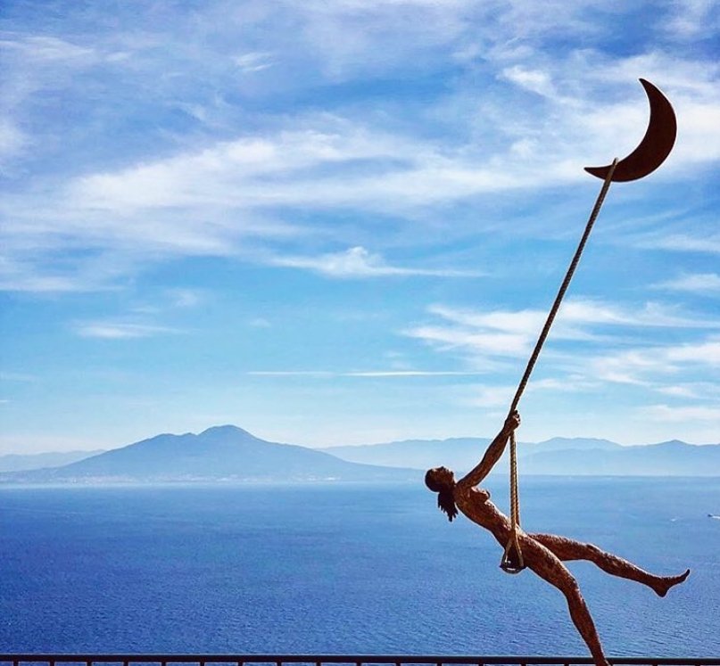 Italian sculptor Giacinto Bosco's artwork titled 'Altalena' with a view of the sea. (Courtesy of Giacinto Bosco)