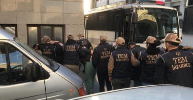 Police officers escort suspected Mossad spies to court, Istanbul, Türkiye, Sept. 18, 2024. (IHA Photo)