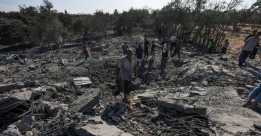  Palestinians search among the rubble of a destroyed house following Israeli airstrikes in the Al-Maghazi refugee camp, Gaza Strip, Oct. 17, 2024. (EPA Photo