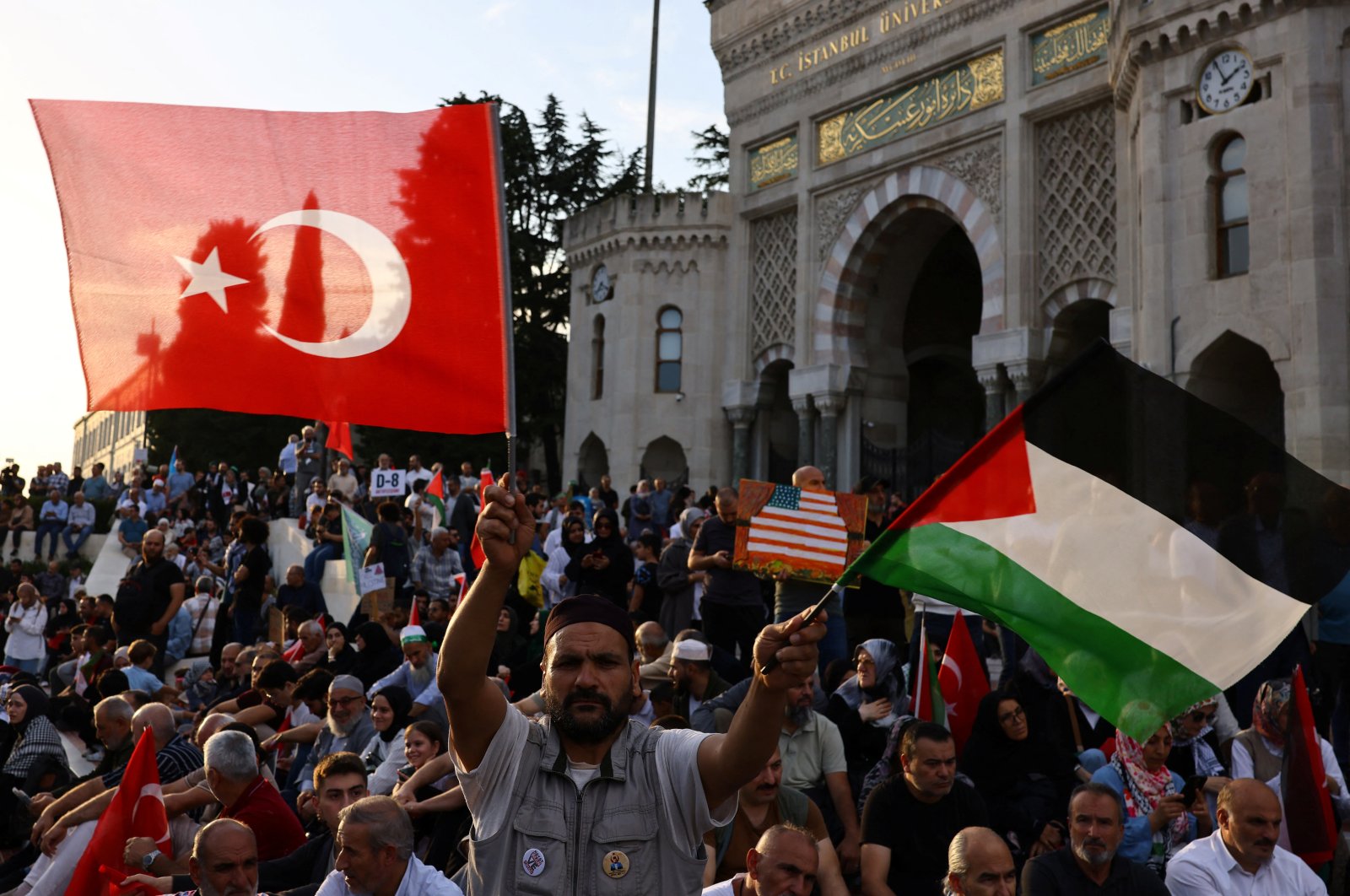 A demonstrator waves Turkish and Palestinian flags during a protest to express support for Palestinians in Gaza, a day ahead of the anniversary of the Oct. 7 attack, amid the Israel-Palestine conflict, Istanbul, Türkiye, Oct. 6, 2024. (Reuters Photo)