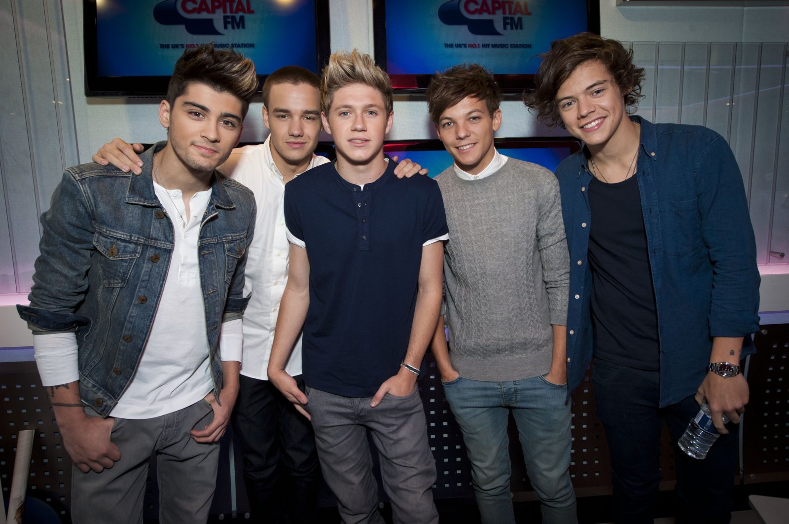 One Direction&#039;s Zayn Malik (from left), Liam Payne, Niall Horan, Louis Tomlinson and Harry Styles pictured during an interview, London, Oct. 5, 2012. (AP Photo)