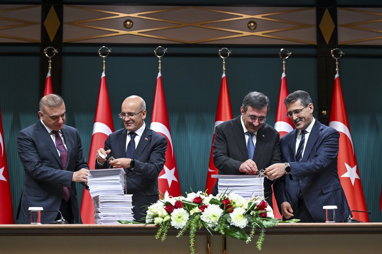 Vice President Cevdet Yılmaz (2nd R) and Treasury and Finance Minister Mehmet Şimşek (2nd L) attend the meeting to present the draft budget for 2025, Ankara, Türkiye, Oct. 17, 2024. (AA Photo)