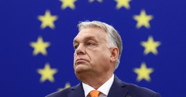 Hungary's Prime Minister Viktor Orban looks on in front of the EU flag as he gives a speech to the European Parliament, Strasbourg, France, Oct. 9, 2024. (Reuters Photo)