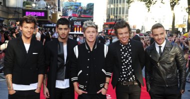 From left to right, Louis Tomlinson, Zayn Malik, Niall Horan, Harry Styles and Liam Payne arrive for the World Premiere of &quot;One Direction: This Is Us,&quot; at the Empire Leicester Square, London, U.K. Aug. 20, 2013. (AP Photo)