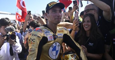 Turkish rider Toprak Razgatlıoğlu (C) after winning the 2024 WSBK title in Jerez, Spain, Oct. 19, 2024. (AA Photo)