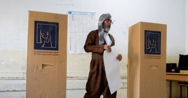 A Kurdish man votes at a polling station during the parliamentary election in northern Iraq's Kurdish region, Irbil, Iraq, Oct. 20, 2024. (Reuters Photo)