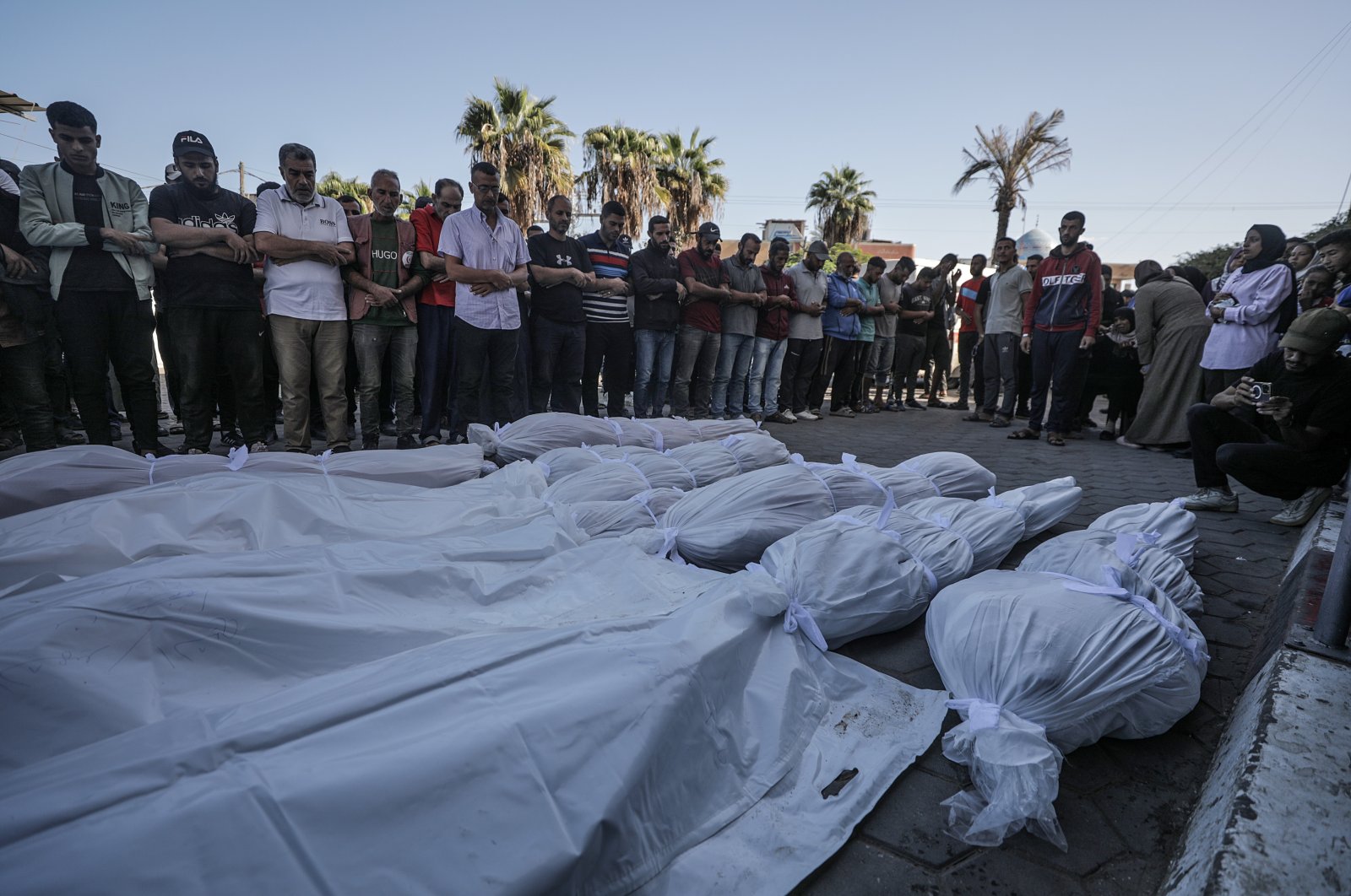 Palestinian relatives of the Shnaa family mourn during a funeral near Al-Aqsa Martyrs Hospital, Deir al-Balah, central Gaza Strip, Palestine, Oct. 19, 2024. (EPA Photo)