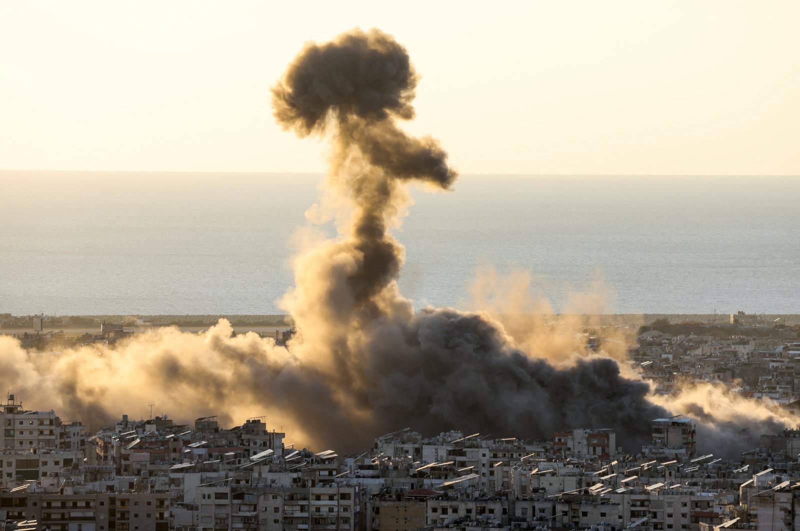 Smoke billows over Beirut&#039;s southern suburbs after an Israeli strike, amid the ongoing hostilities between Hezbollah and Israeli forces, as seen from Hadath, Lebanon, Oct. 19, 2024. (Reuters Photo)