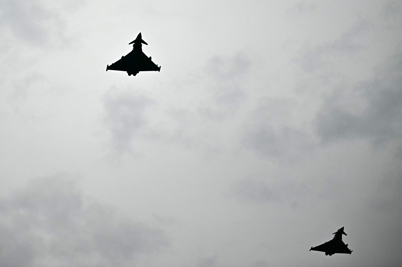 A Eurofighter jet flies over Berlin Brandenburg Airport in Schoenefeld, southeast of Berlin, Germany, Sept. 26, 2024. (AFP Photo)