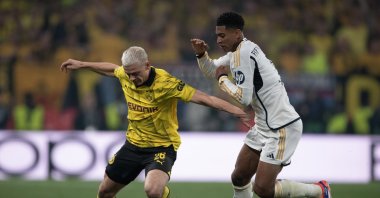 Borussia Dortmund's Julian Ryerson (L) and Real Madrid's Jude Bellingham in action during the UEFA Champions League 2023/24 final match between Borussia Dortmund vs. Real Madrid CF at Wembley Stadium, London, U.K., June 1, 2024. (Getty Images Photo)
