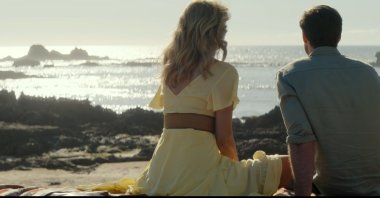 A still shot of Liam Hemsworth and Laura Dern from the movie &quot;Lonely Planet.&quot;