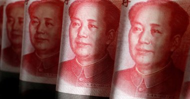 Chinese yuan banknotes are seen in this illustration picture taken on April 25, 2022. (Reuters Photo)