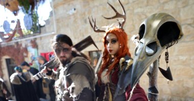 The medieval fair attracted visitors dressed in period attire, creating a vibrant atmosphere reminiscent of the Middle Ages, Nevşehir, Türkiye, Oct. 19, 2024. (AA Photo)