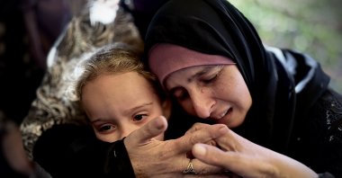 Relatives of a Palestinian killed in an Israeli strike react during his funeral in Khan Younis in the southern Gaza Strip, Palestine, Oct. 21, 2024. (AA Photo)