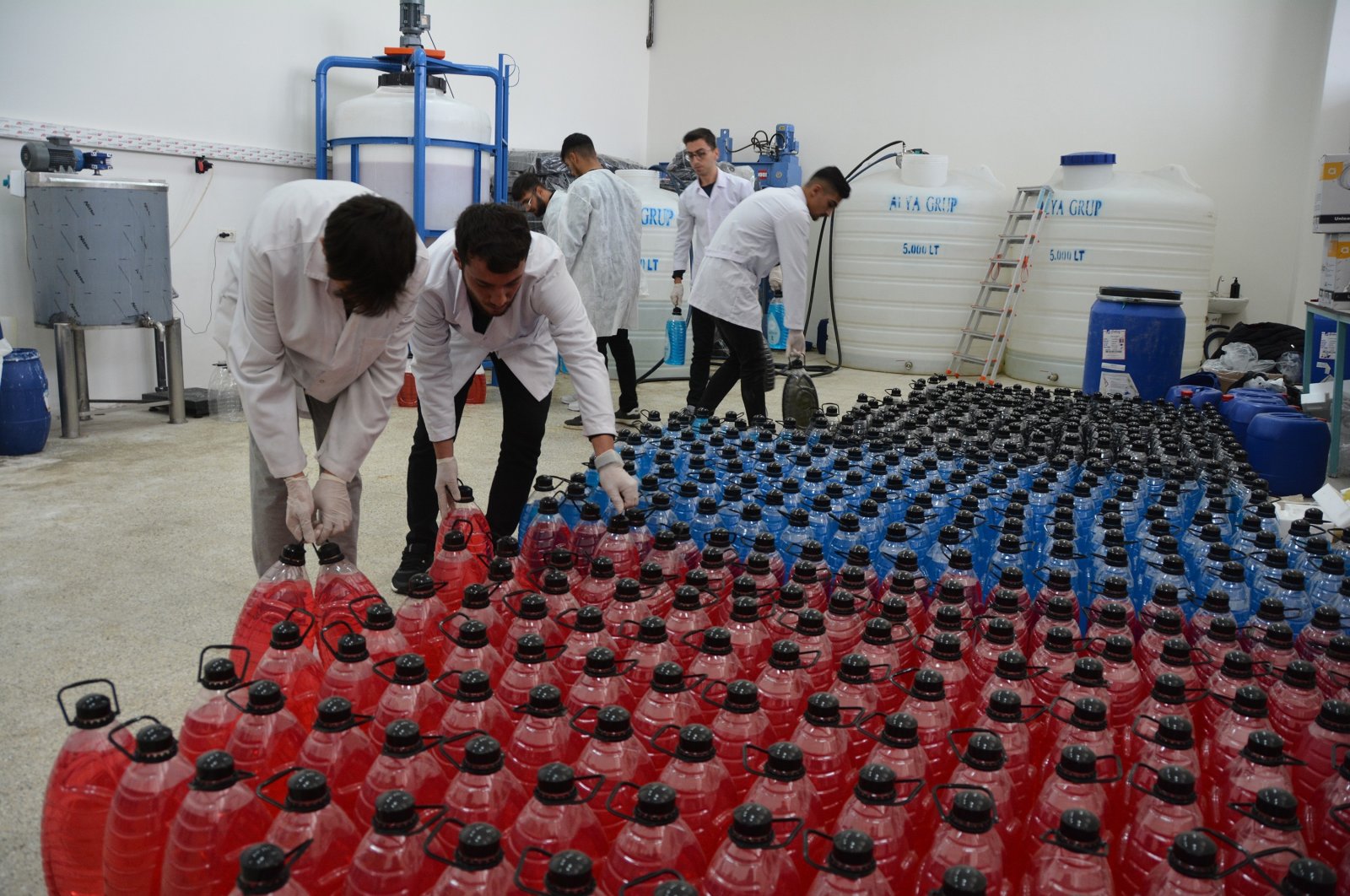 The Bitlis Eren University team works on liquid soap produced from Lake Van&#039;s alkaline waters, Bitlis, Türkiye, Oct. 21, 2024. (IHA Photo)