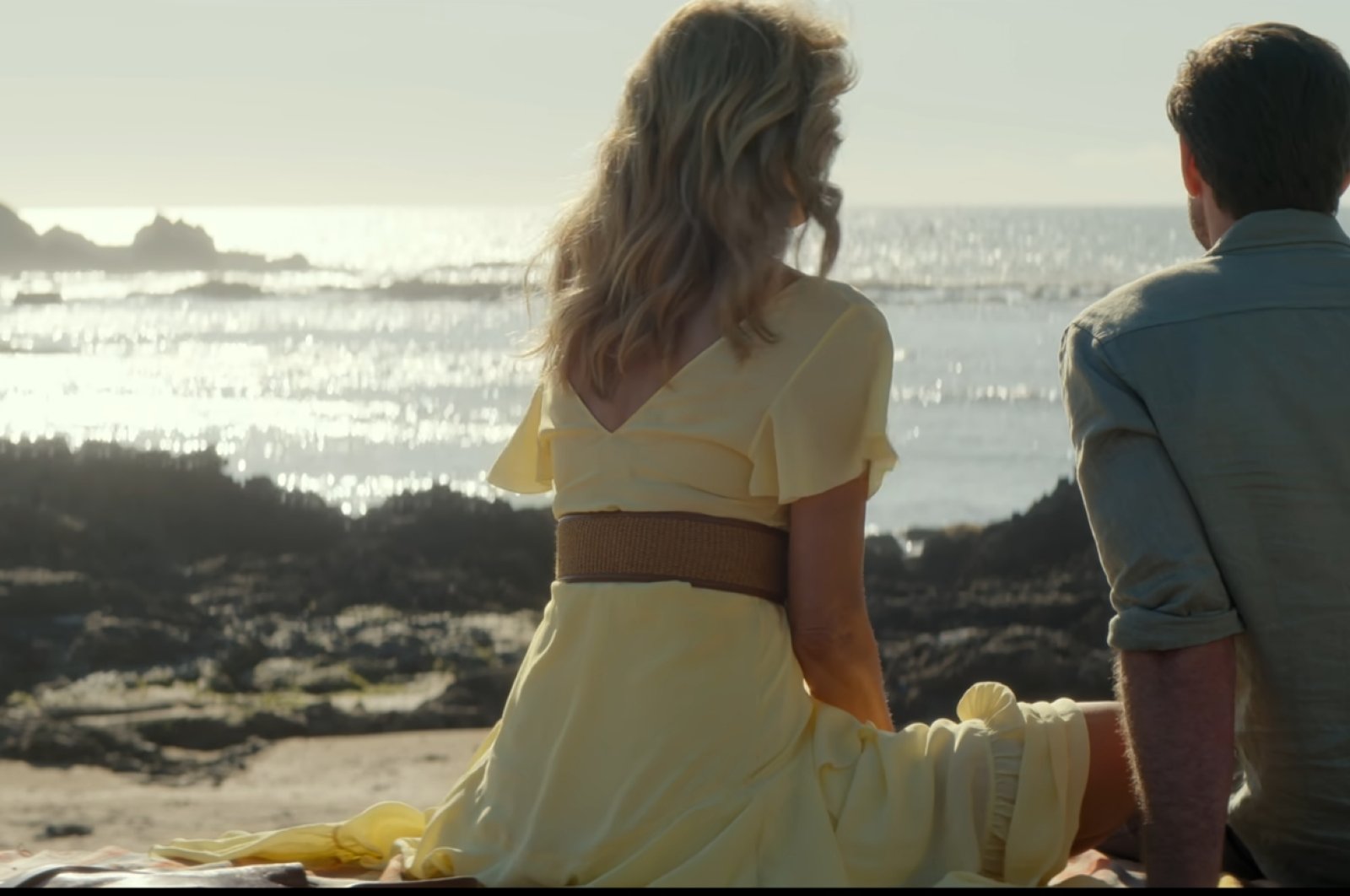 A still shot of Liam Hemsworth and Laura Dern from the movie &quot;Lonely Planet.&quot;