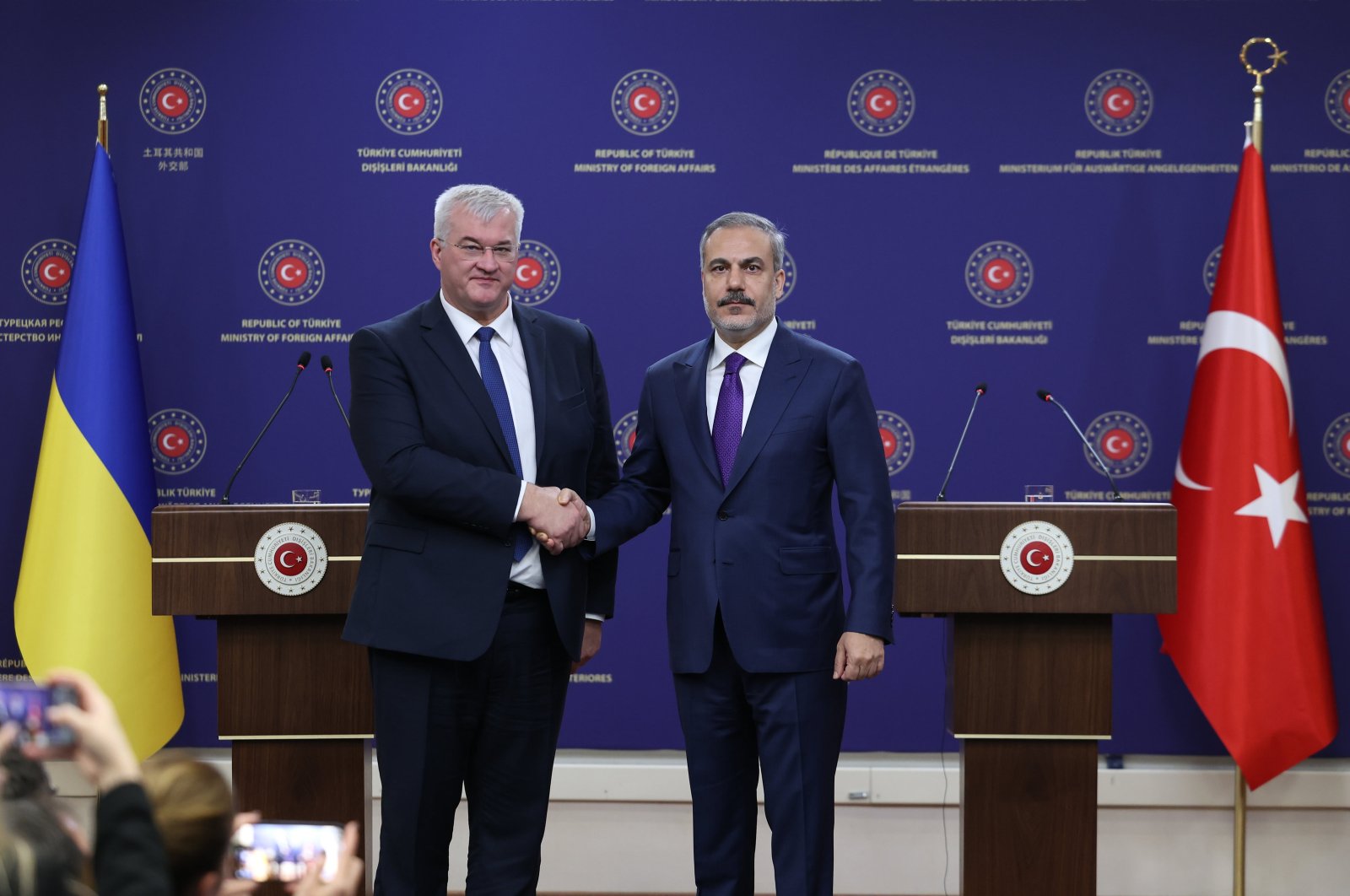 Foreign Minister Hakan Fidan (R) and Ukrainian Foreign Minister Andrii Sybiha shake hands after their news conference, Ankara, Türkiye, Oct. 21, 2024. (AA Photo)