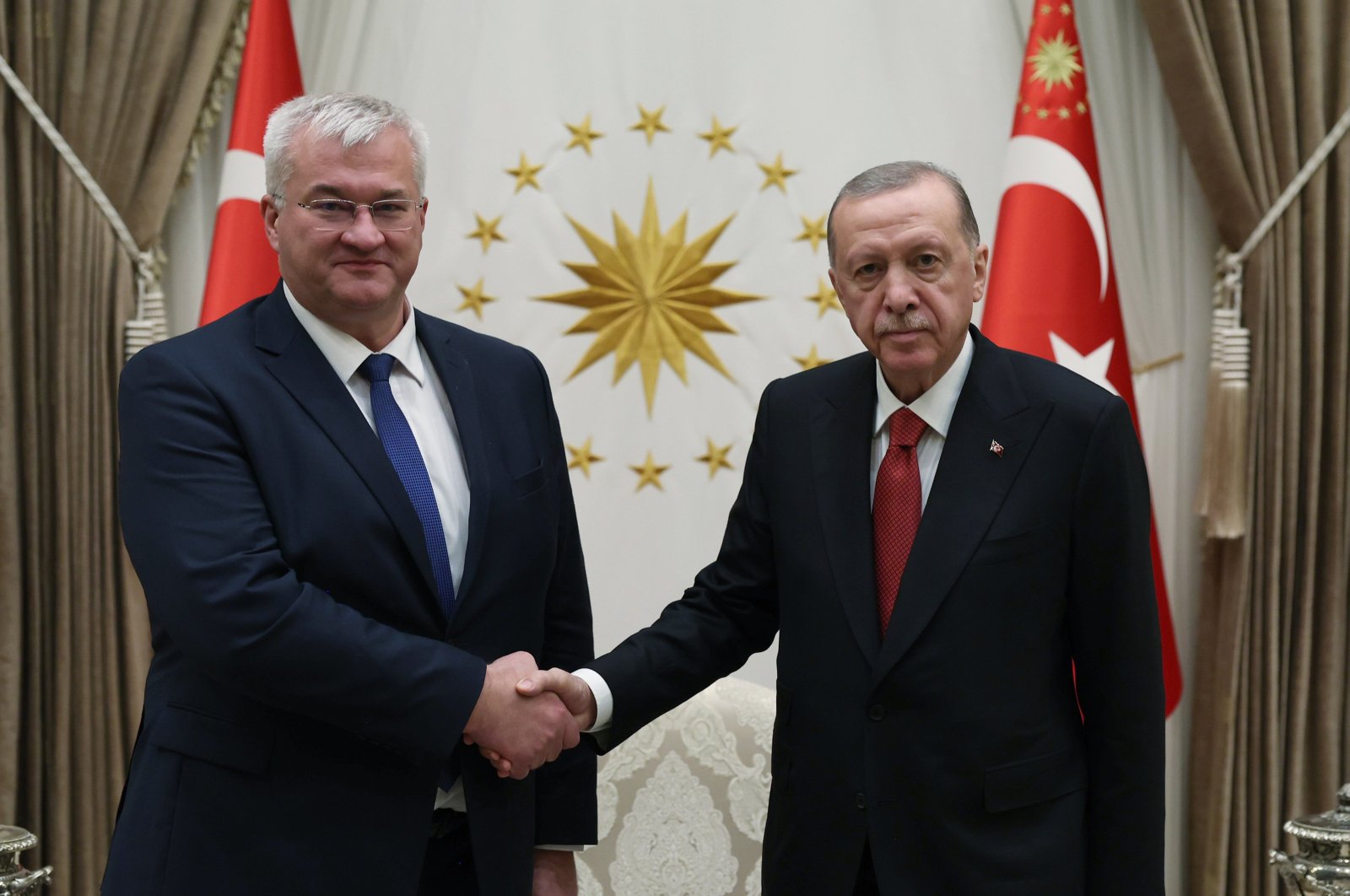 President Recep Tayyip Erdoğan and Ukraine&#039;s Foreign Minister Andrii Sybiha shake hands in Ankara, Oct. 21, 2024. (AA Photo)